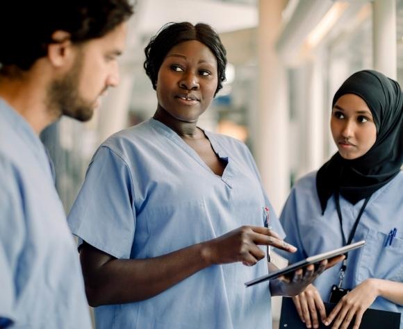 Image of diverse vituity physicians working together